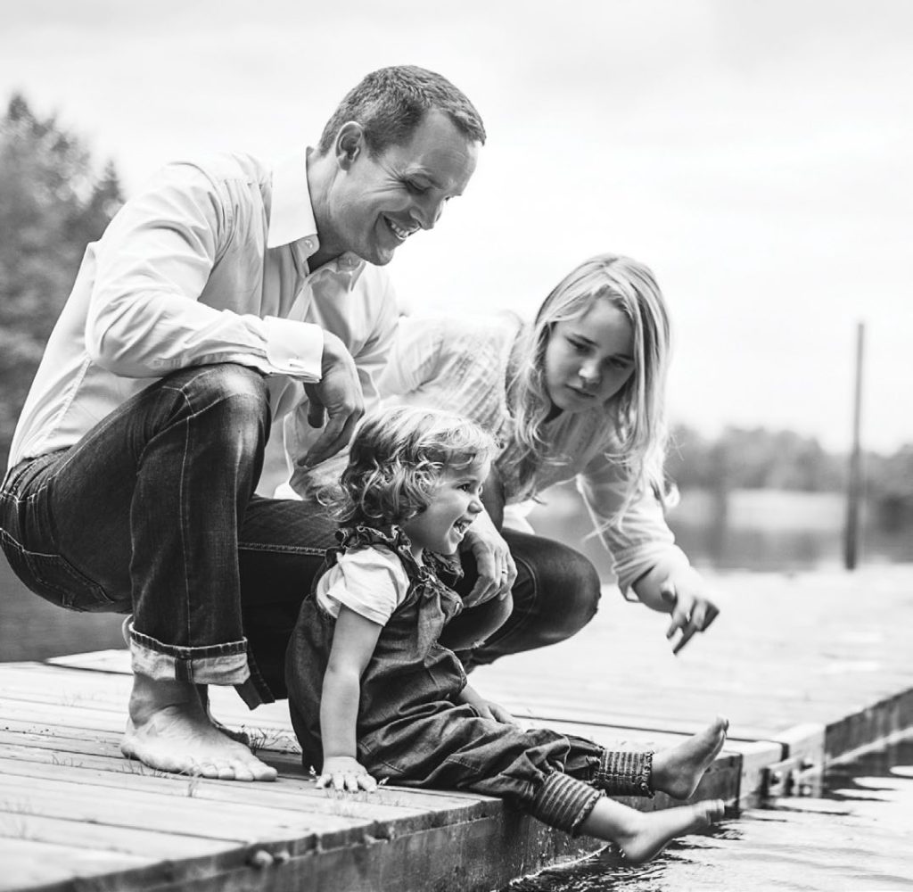 Family enjoying time together by the water.