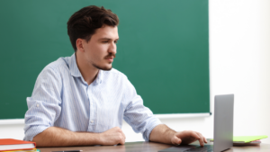 teacher at desk