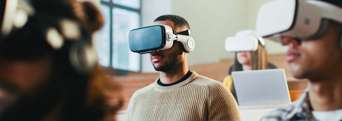 Students using virtual reality headsets in class.
